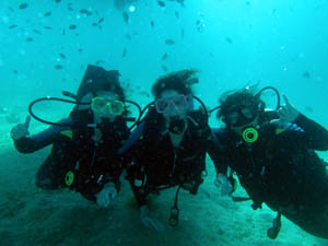 three divers underwater